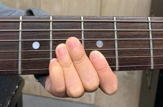 What Guitar Specs to Look for When You Have Small Hands - Adirondack Guitar