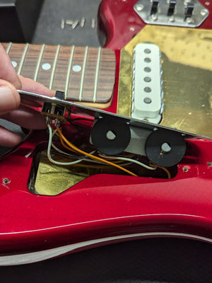 Used Fender 1998 MIJ Jaguar close up of the rotary knobs