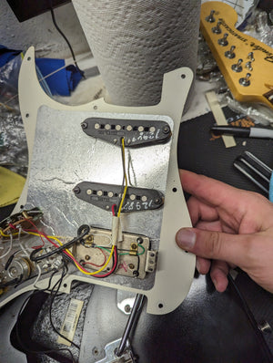 Used Fender 2007 Highway One Stratocaster back of the pickguard