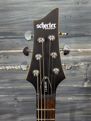 Used Schecter C-6 Deluxe front of the headstock