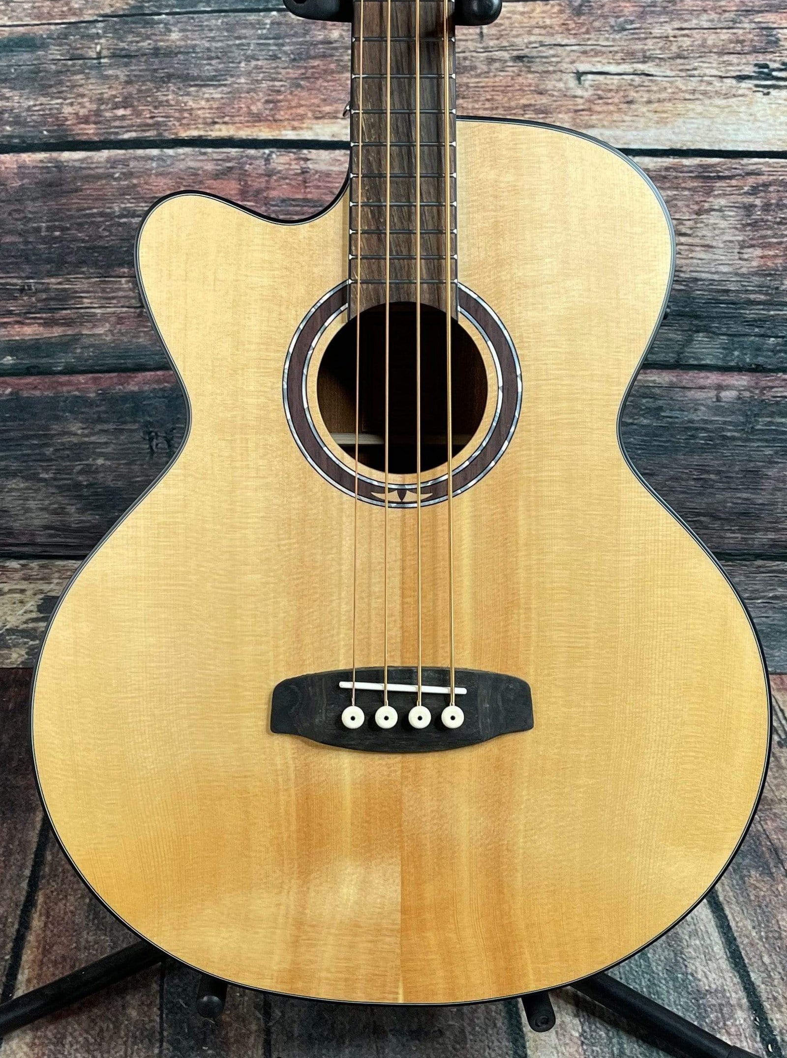 Left handed deals acoustic bass